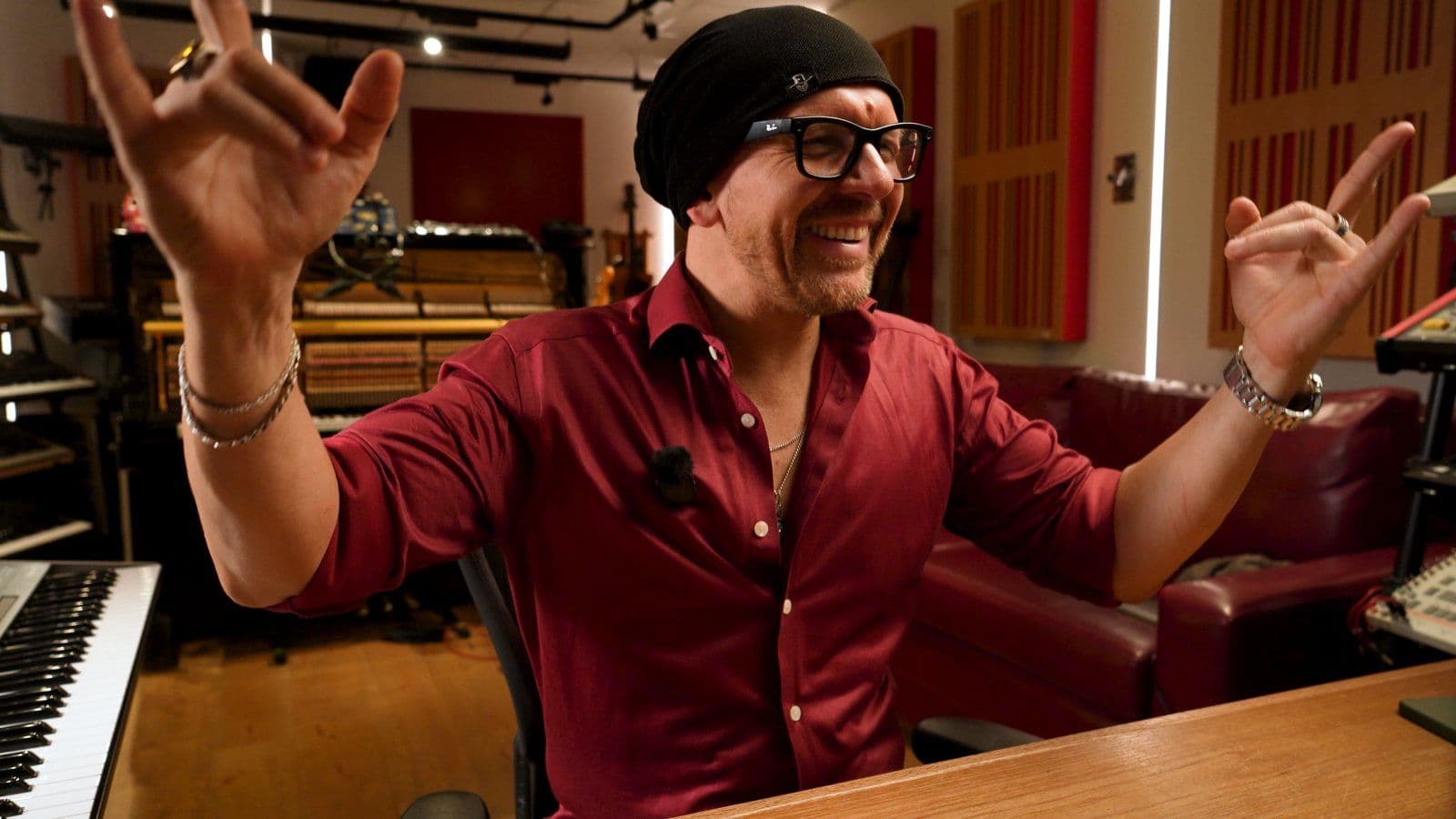 Claudio grinning at the desk in the Doctor Mix studio while remixing Big in Japan